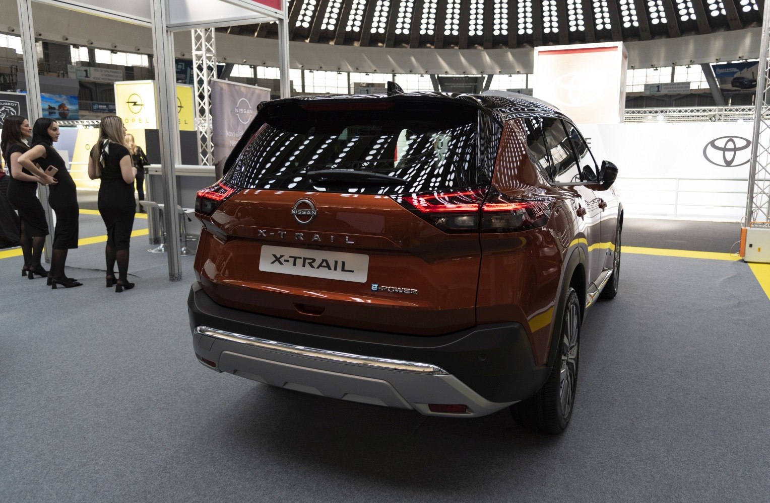 Rear view of SUV with LED tail lights and e-POWER badge.