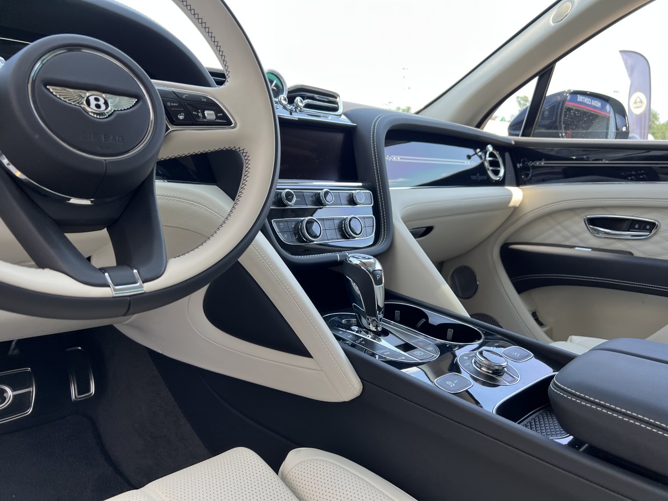 Luxury car interior with plush controls and elegant design