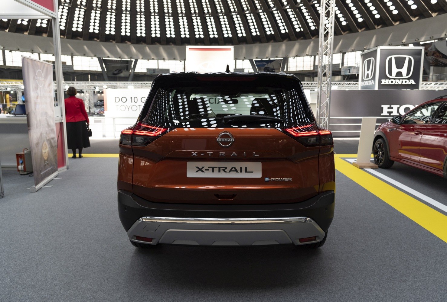 Rear view with distinctive tail lights and modern bumper design
