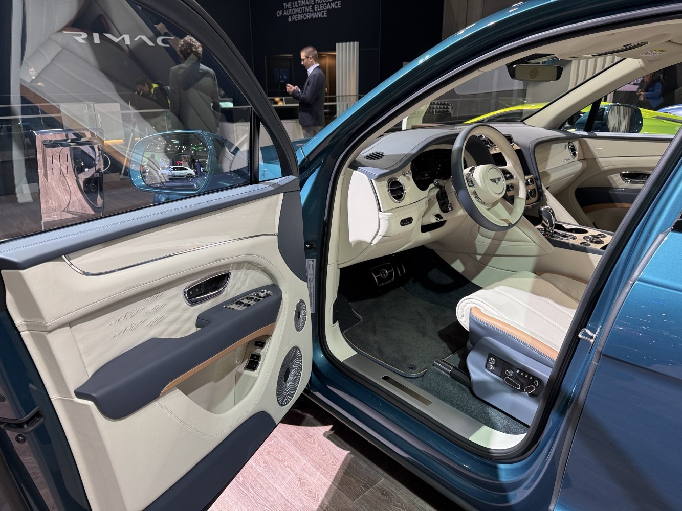 Beige luxury interior with blue accents and detailed stitching