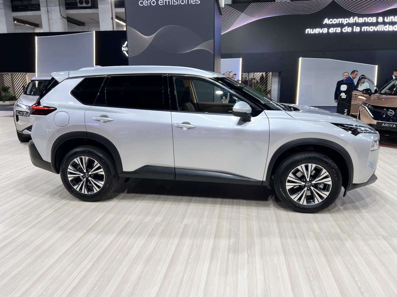 Side profile view of modern SUV with alloy wheels and distinct styling