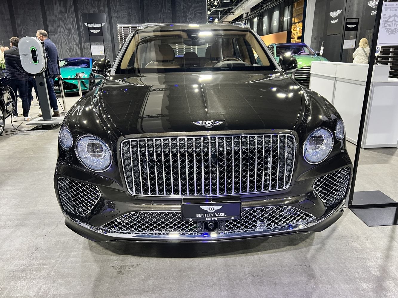 SUV front with large grille and circular LED headlights