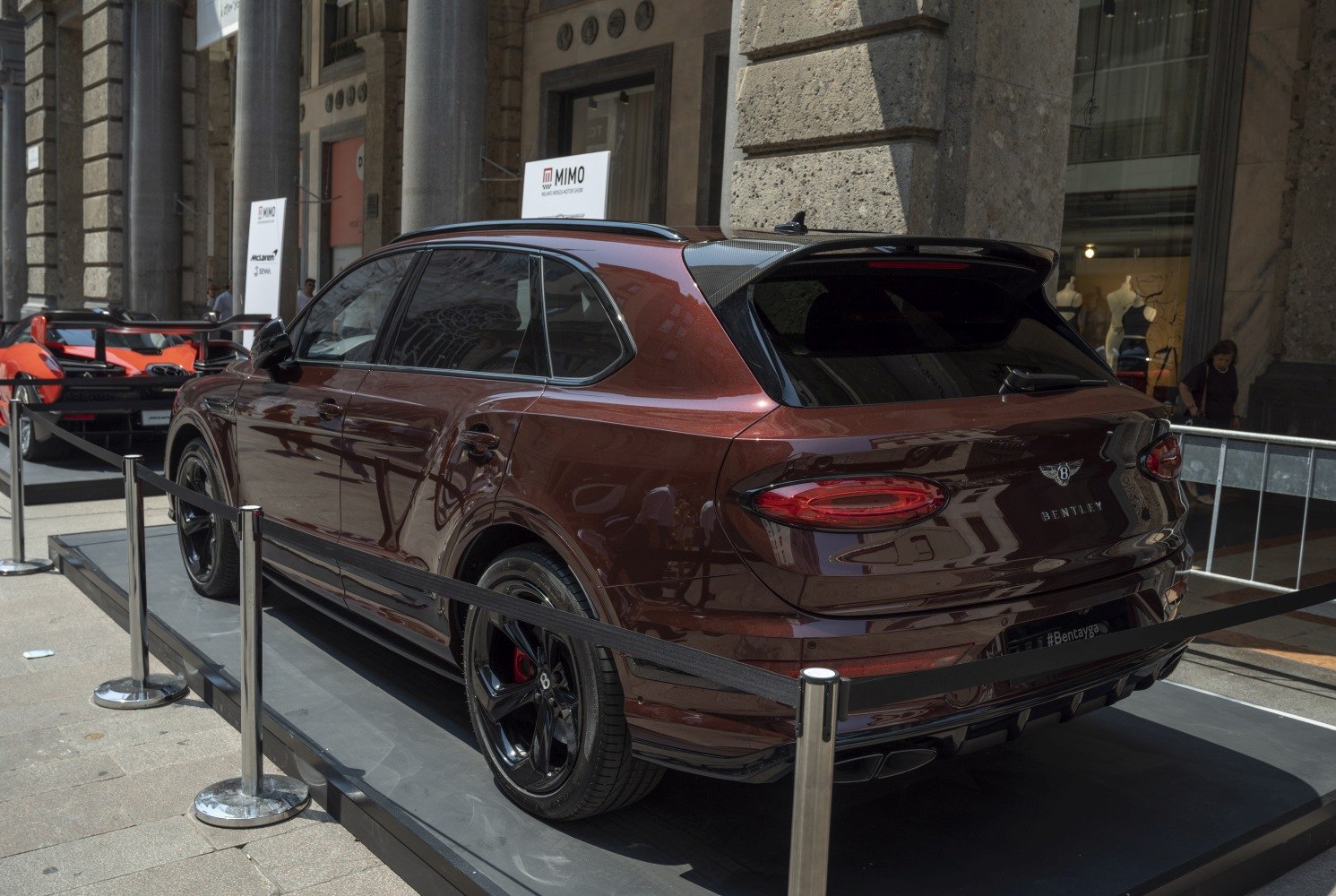 Rear and side view of luxury SUV with sleek taillights and black alloy wheels