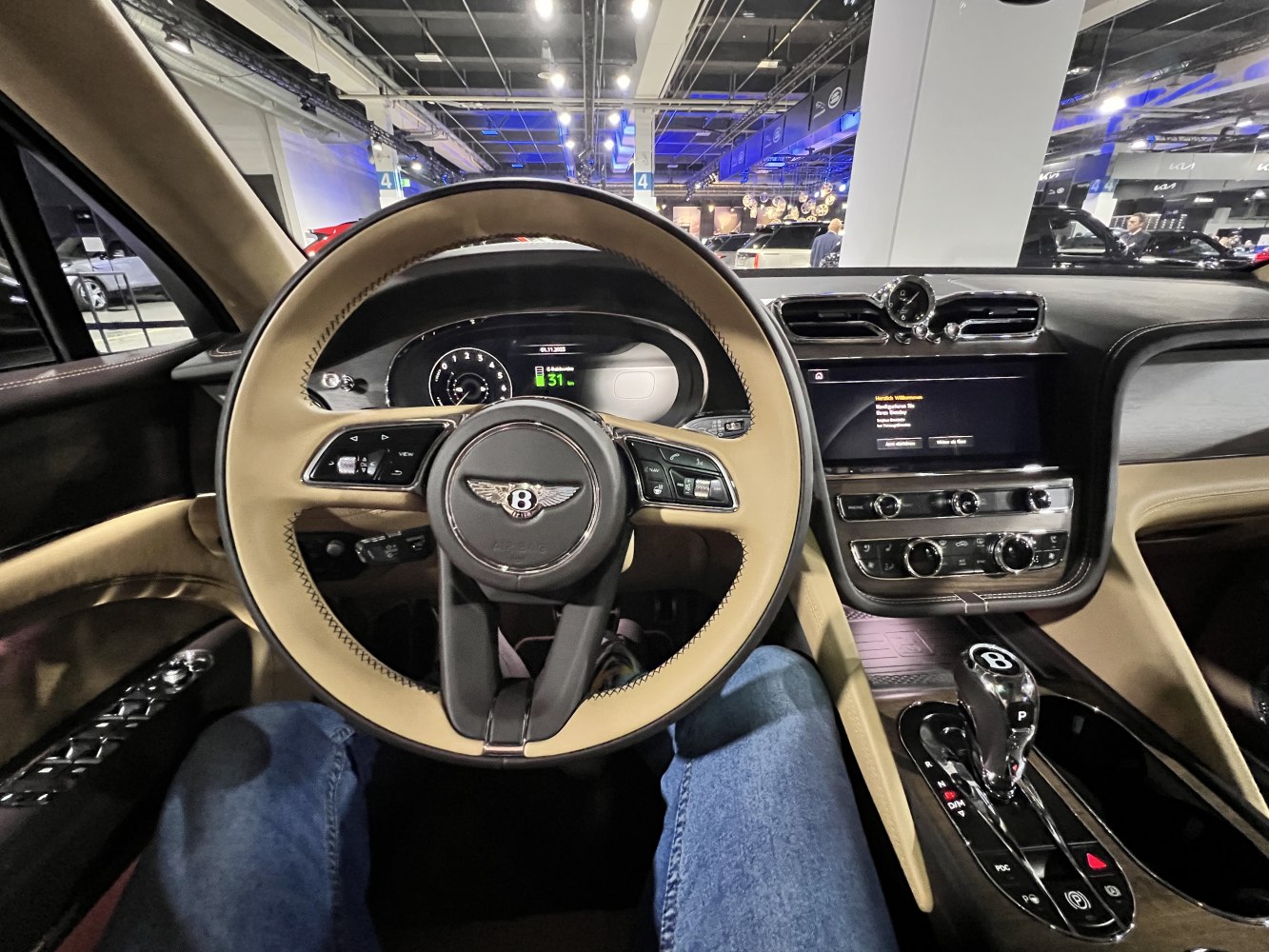 Luxury steering wheel and dashboard with digital instrument cluster and infotainment console