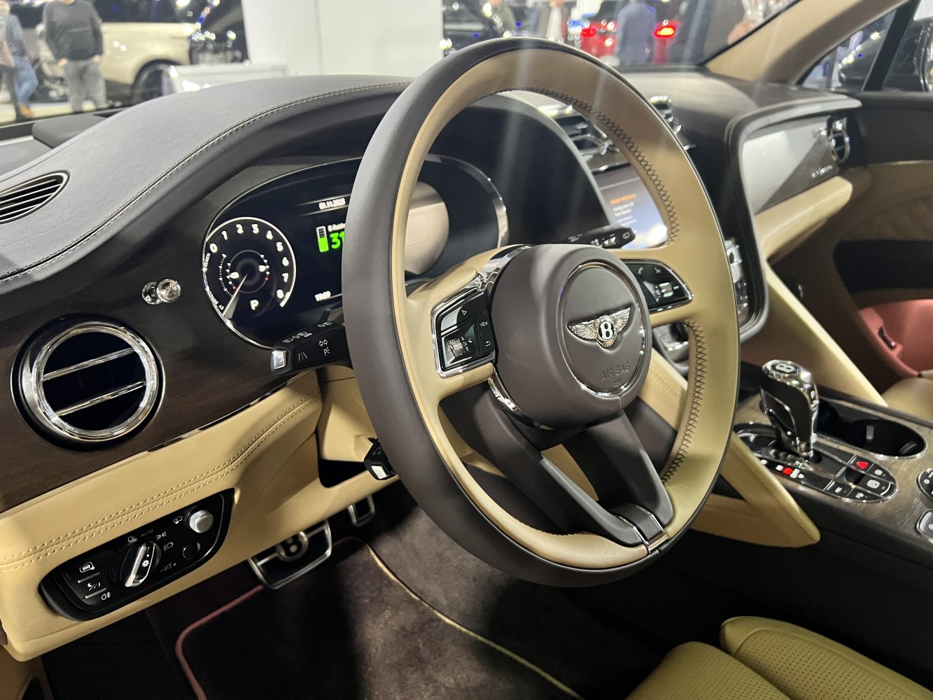 Steering wheel, digital instrument cluster, and center console with luxury finishes