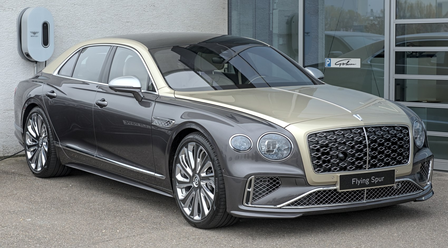 Luxury sedan with intricate front grille and stylish alloy wheels
