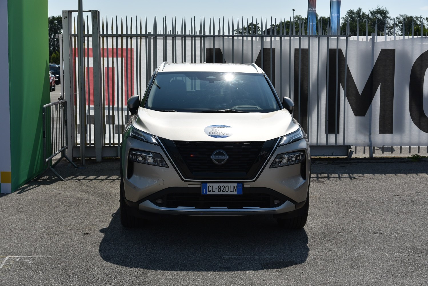 Front view of an SUV with distinct grille and split headlights