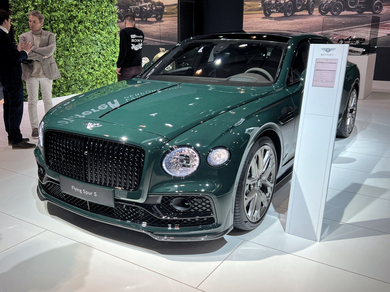 Front grille and LED headlights of luxury sedan at showroom