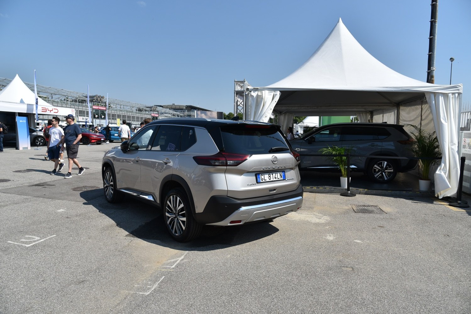 Rear side view of a modern SUV with distinctive tail lights and alloy wheels.