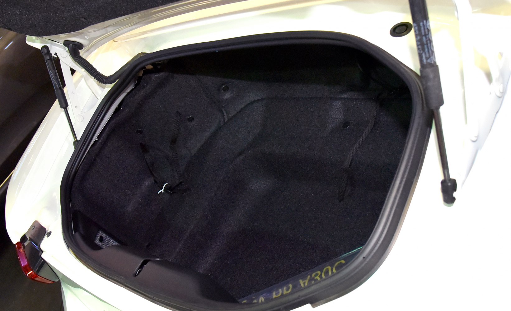 Spacious trunk interior with clean design and cargo area.