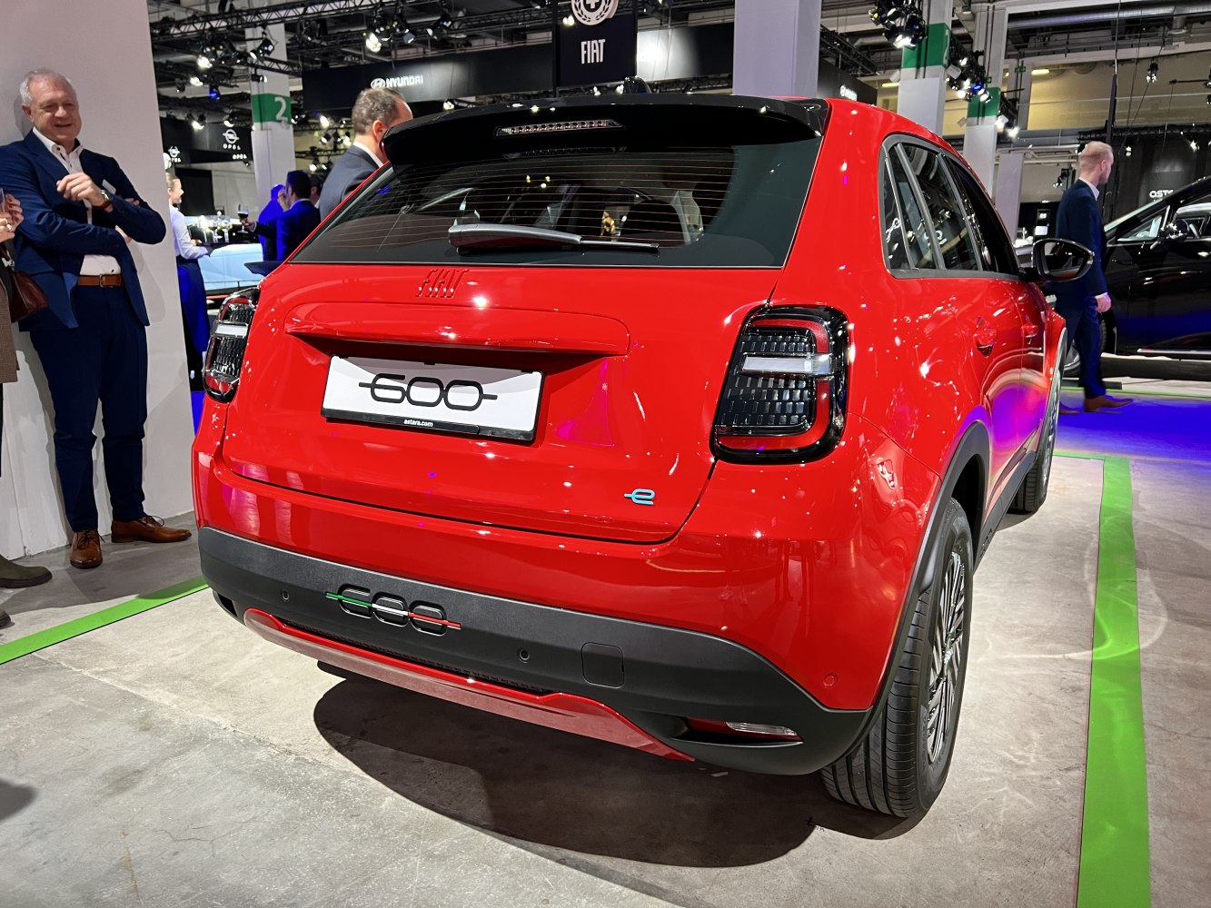 Rear view of a car with black accented bumper and modern taillights