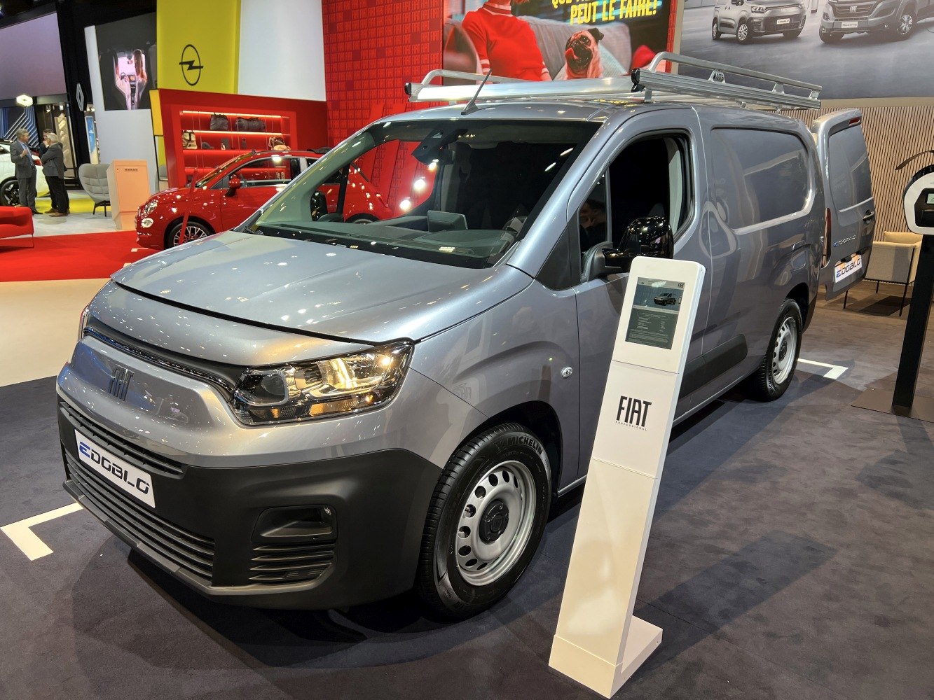 Commercial van front and side view with roof rack and open rear door