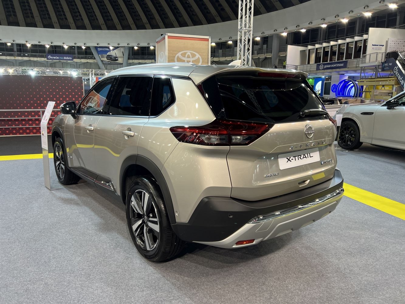 Rear and side view of modern SUV with tinted windows and sleek taillights
