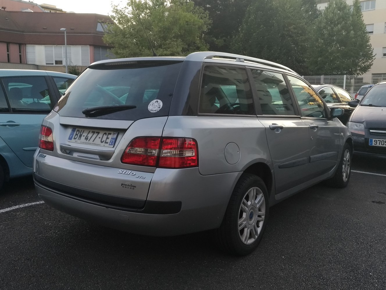Rear view of station wagon with tail lights and rear window wiper