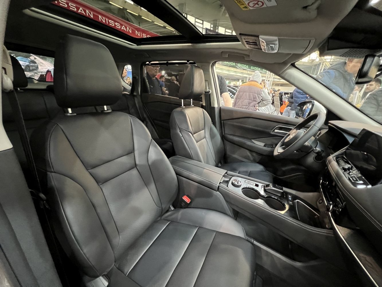 Black leather seats with panorama sunroof and modern center console