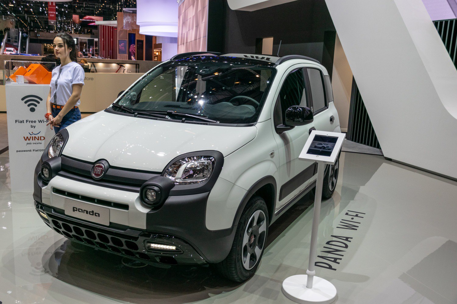Front and side exterior view with distinctive front lighting and black trim