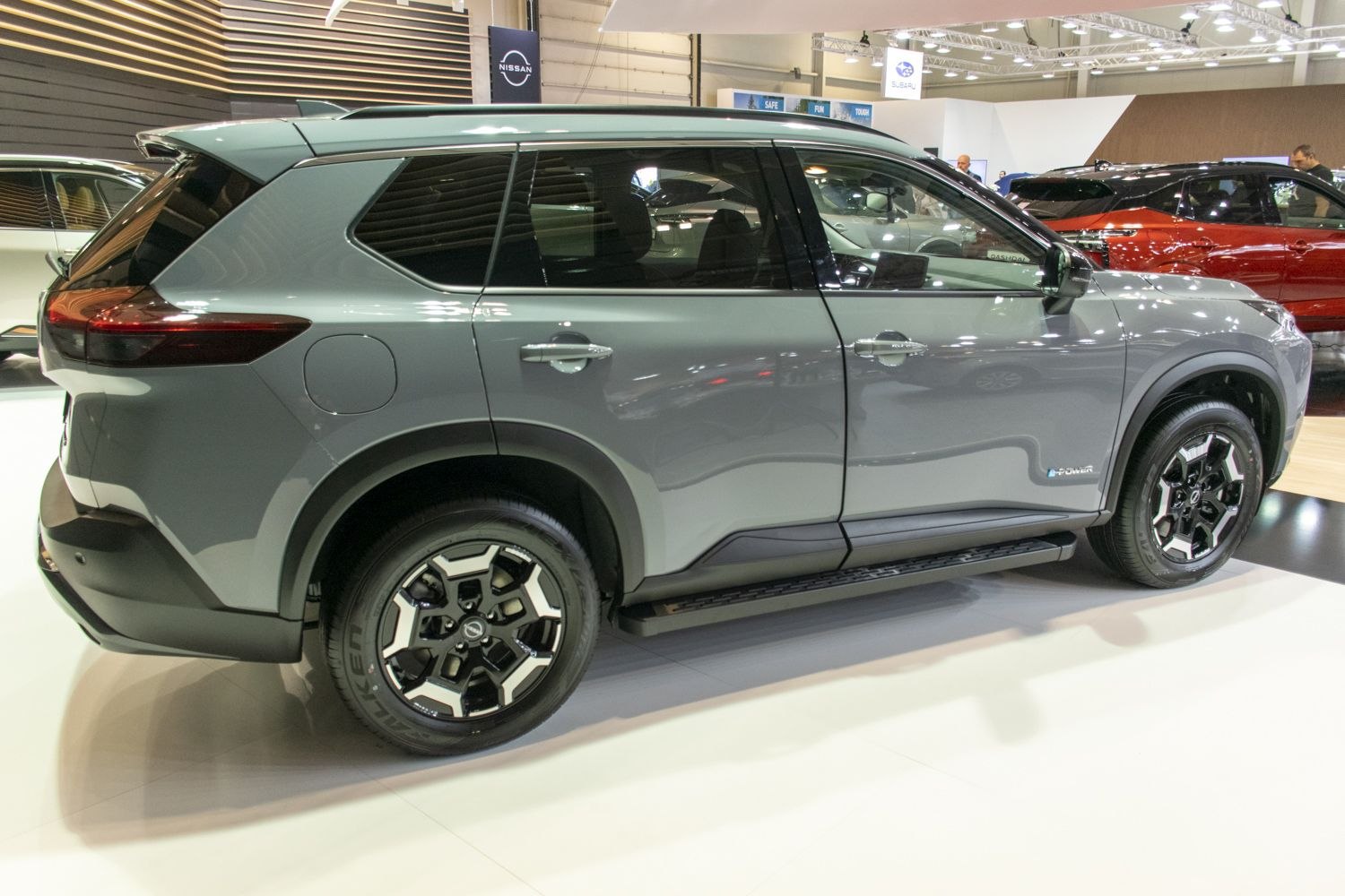 Side profile and alloy wheels of a modern SUV with stylish design.