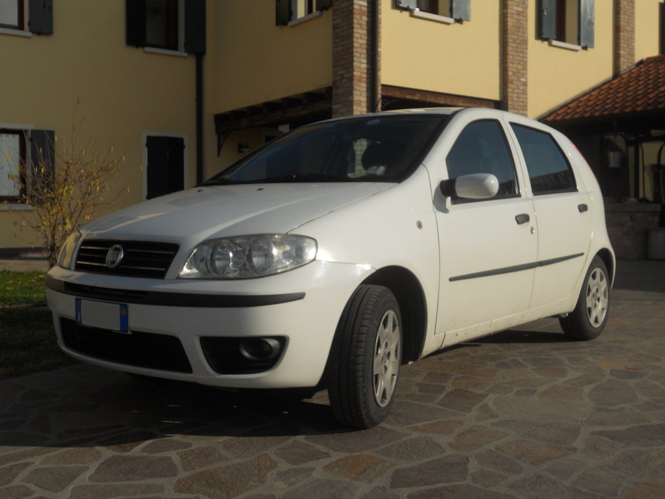 White 5-door hatchback front side view