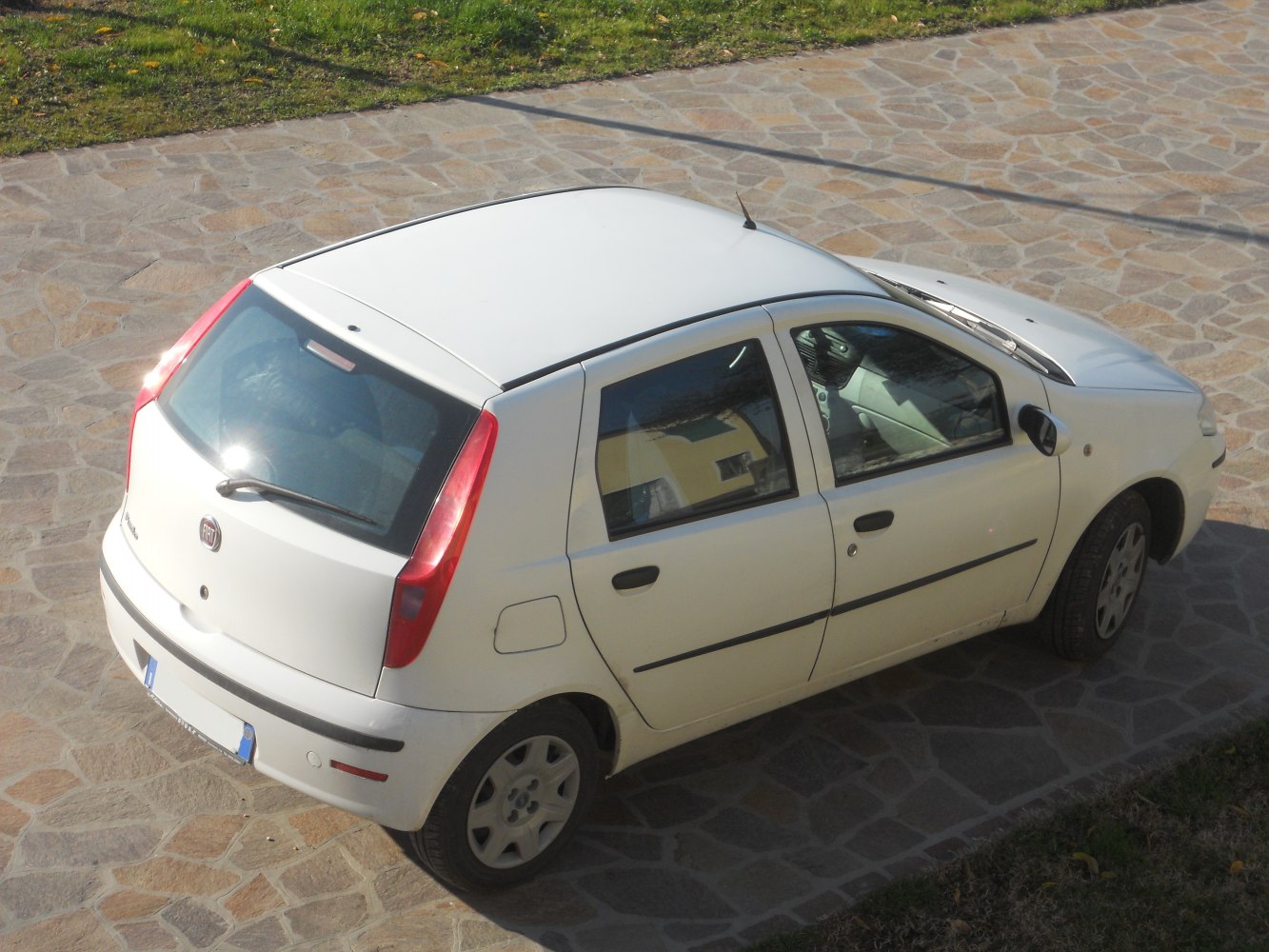 Rear and side view of 5-door hatchback with distinctive rear lights