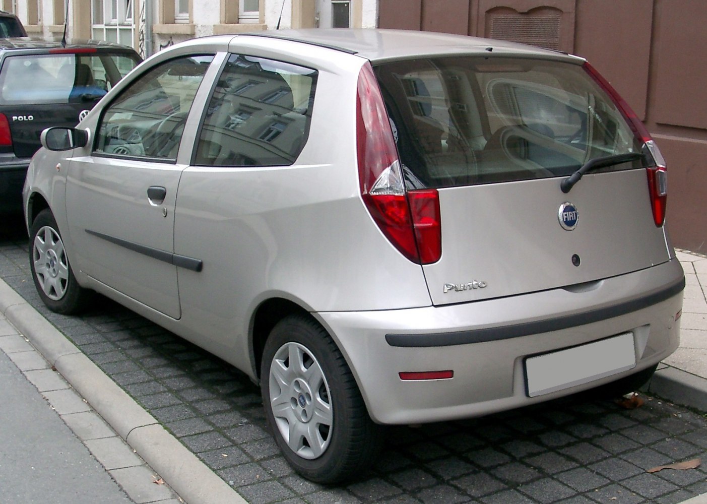 3-door hatchback with vertical tail lights and rear window wiper