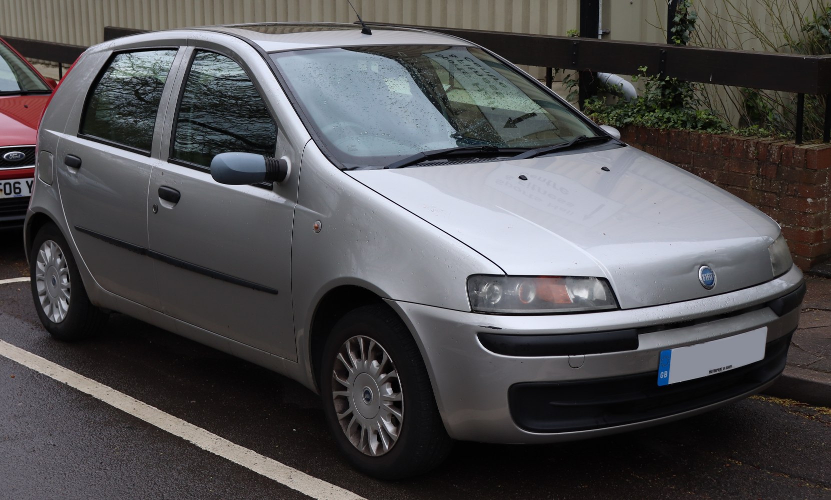 Silver 5-door compact hatchback with distinct Fiat styling