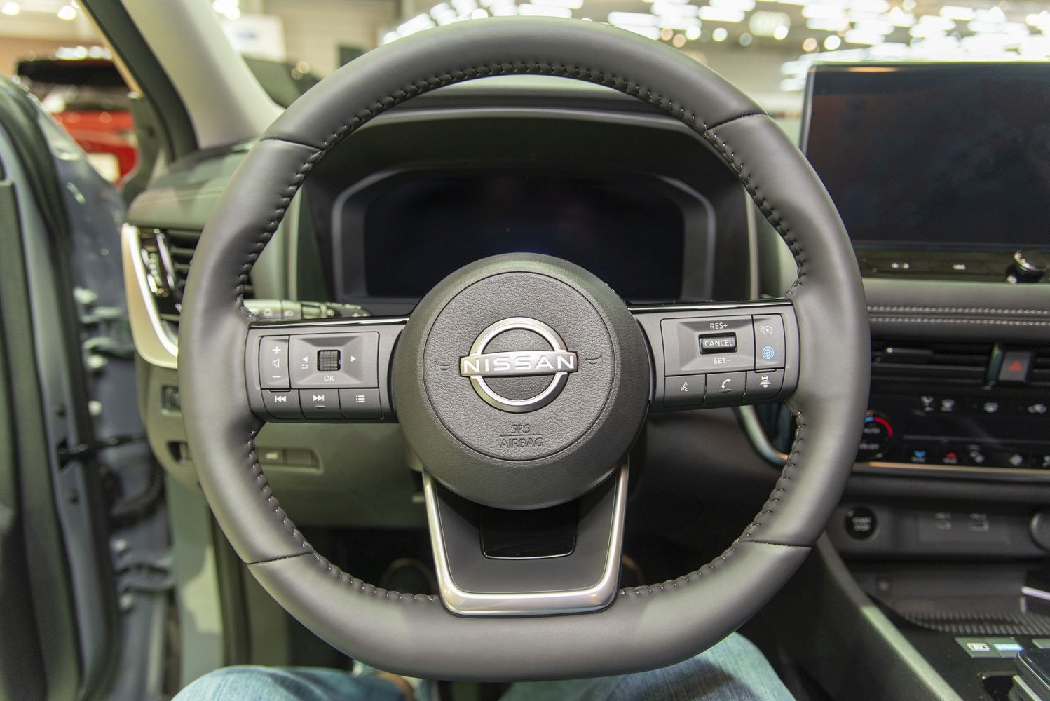 Steering wheel with multifunction buttons and digital dashboard display