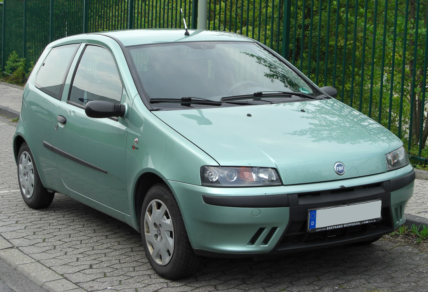 Compact 3-door hatchback with unique front grille and headlights