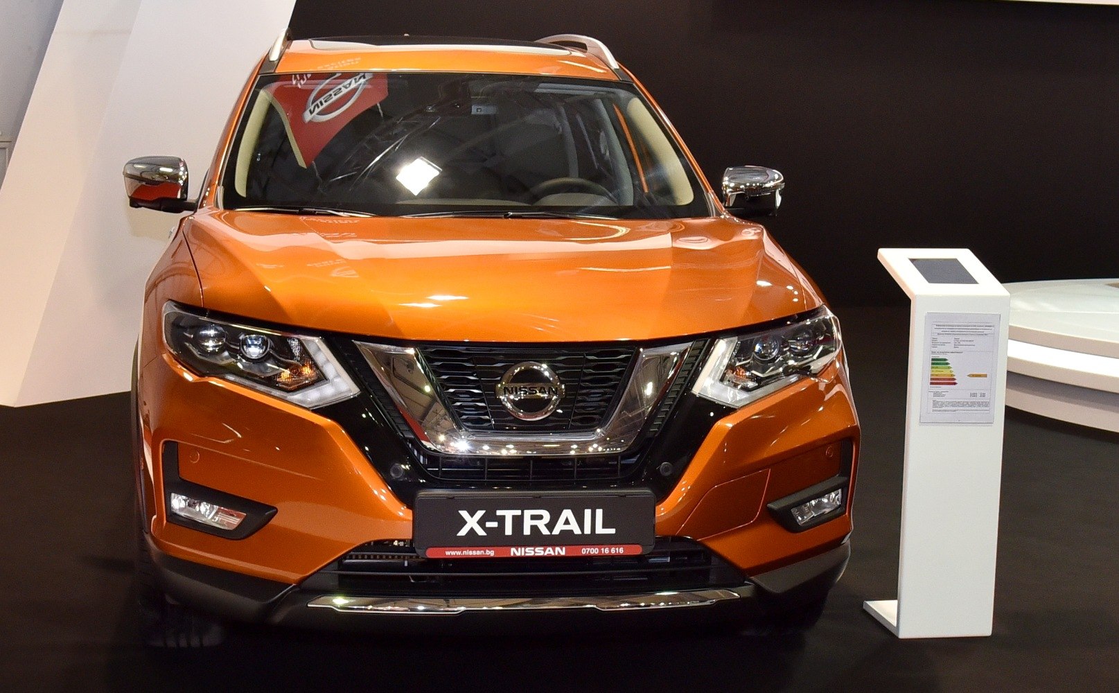 Bold SUV front with sharp headlights and chrome-accented grille