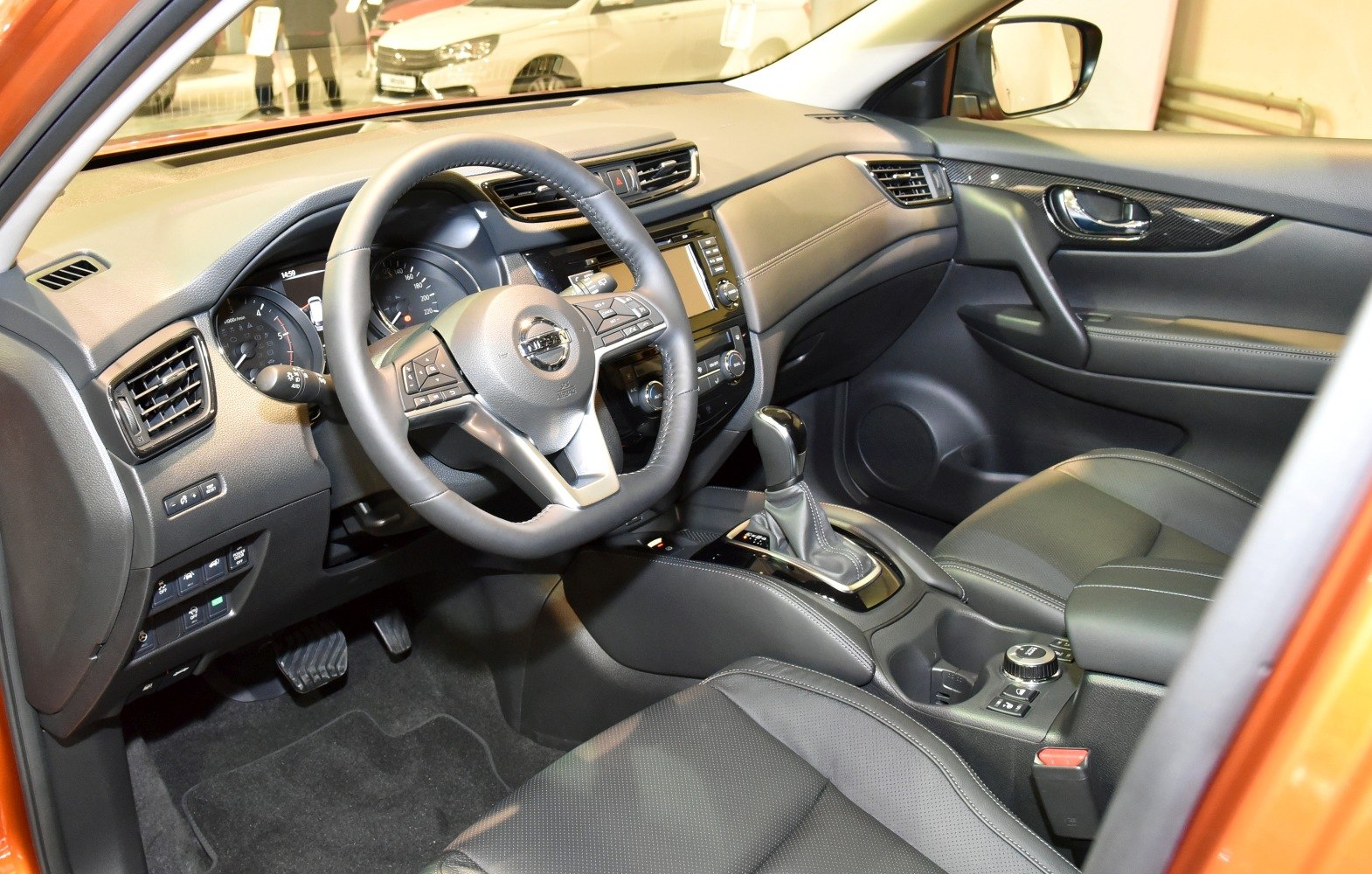 Modern dashboard and multifunction steering wheel.