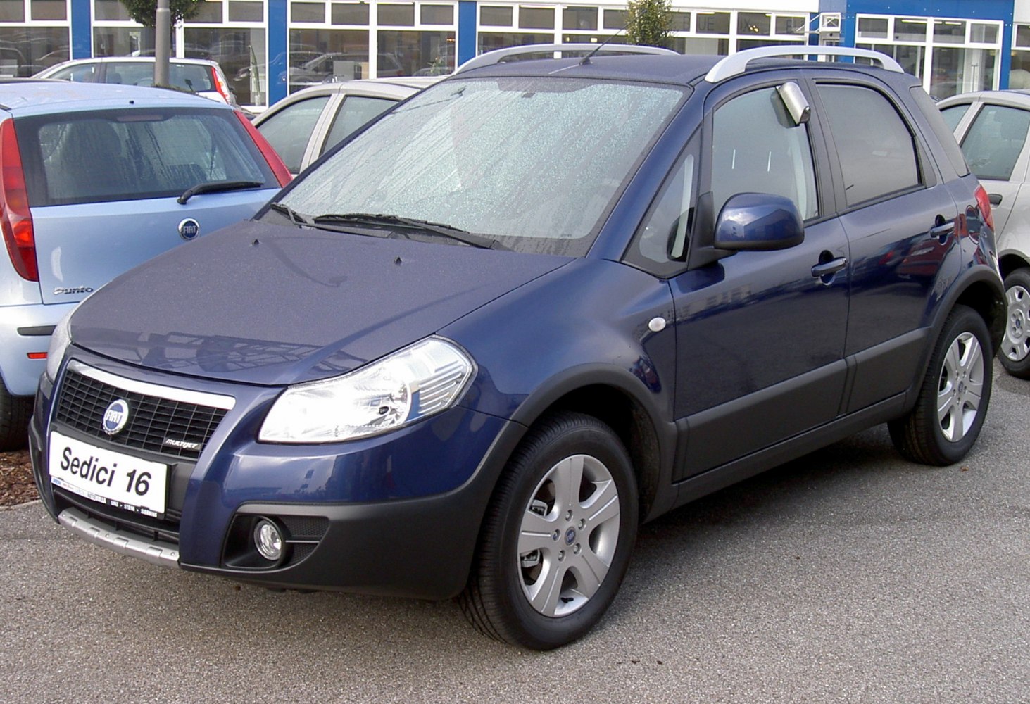 Compact SUV front view with roof rails and alloy wheels