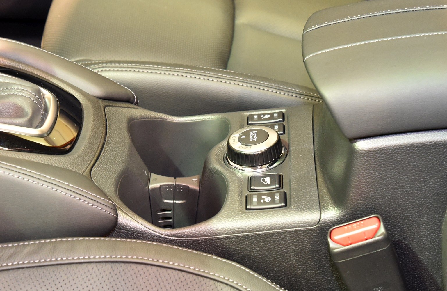 Center console with 4x4 drive mode selector and heated seat buttons