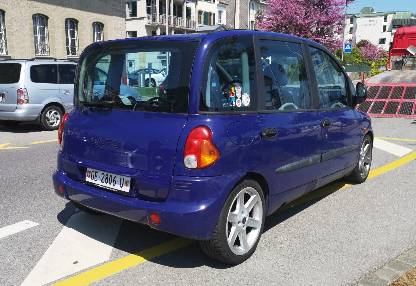 Rear view of compact MPV with rounded rear and large windows