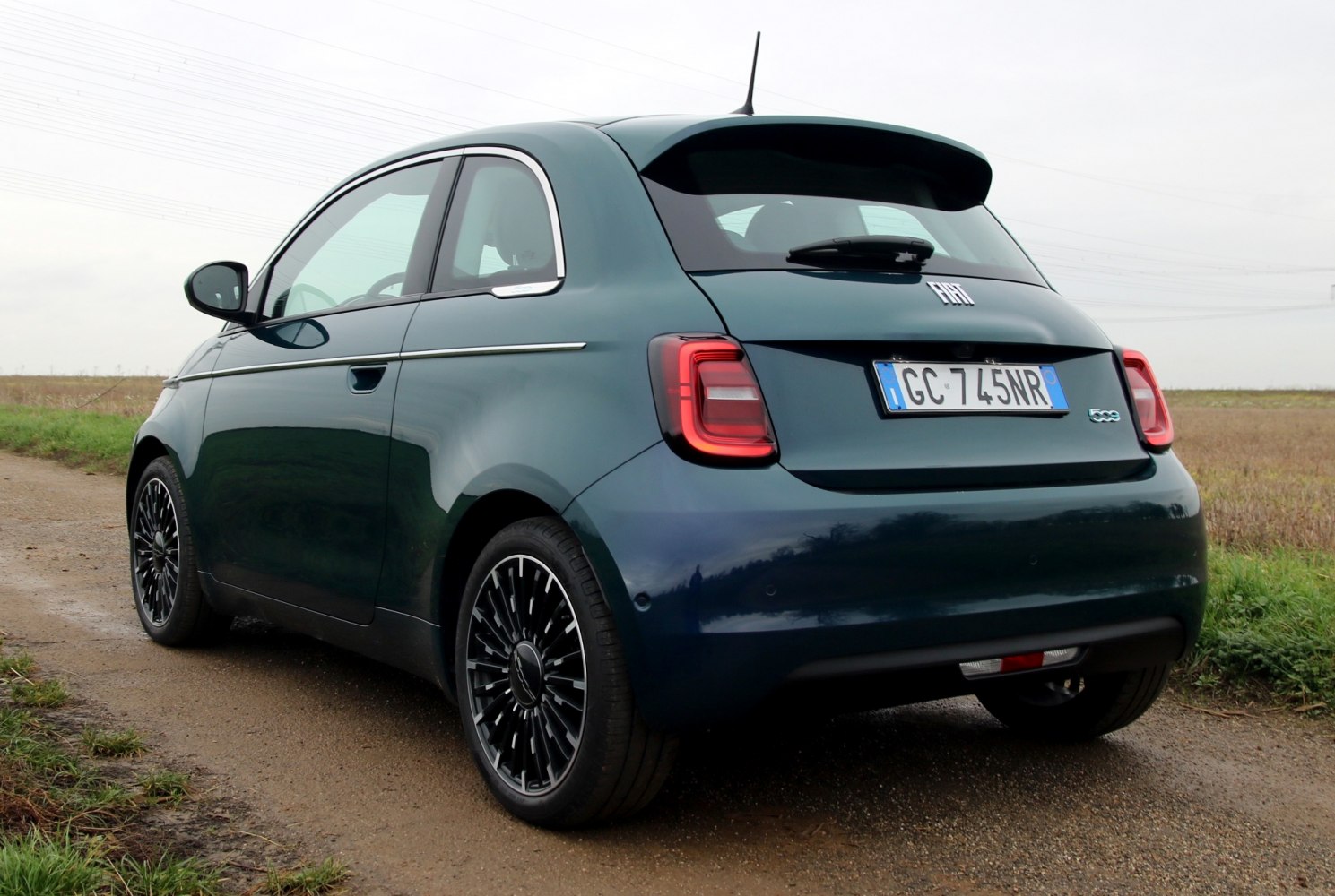 Rear view of compact hatchback with modern LED tail lights and distinctive alloy wheels