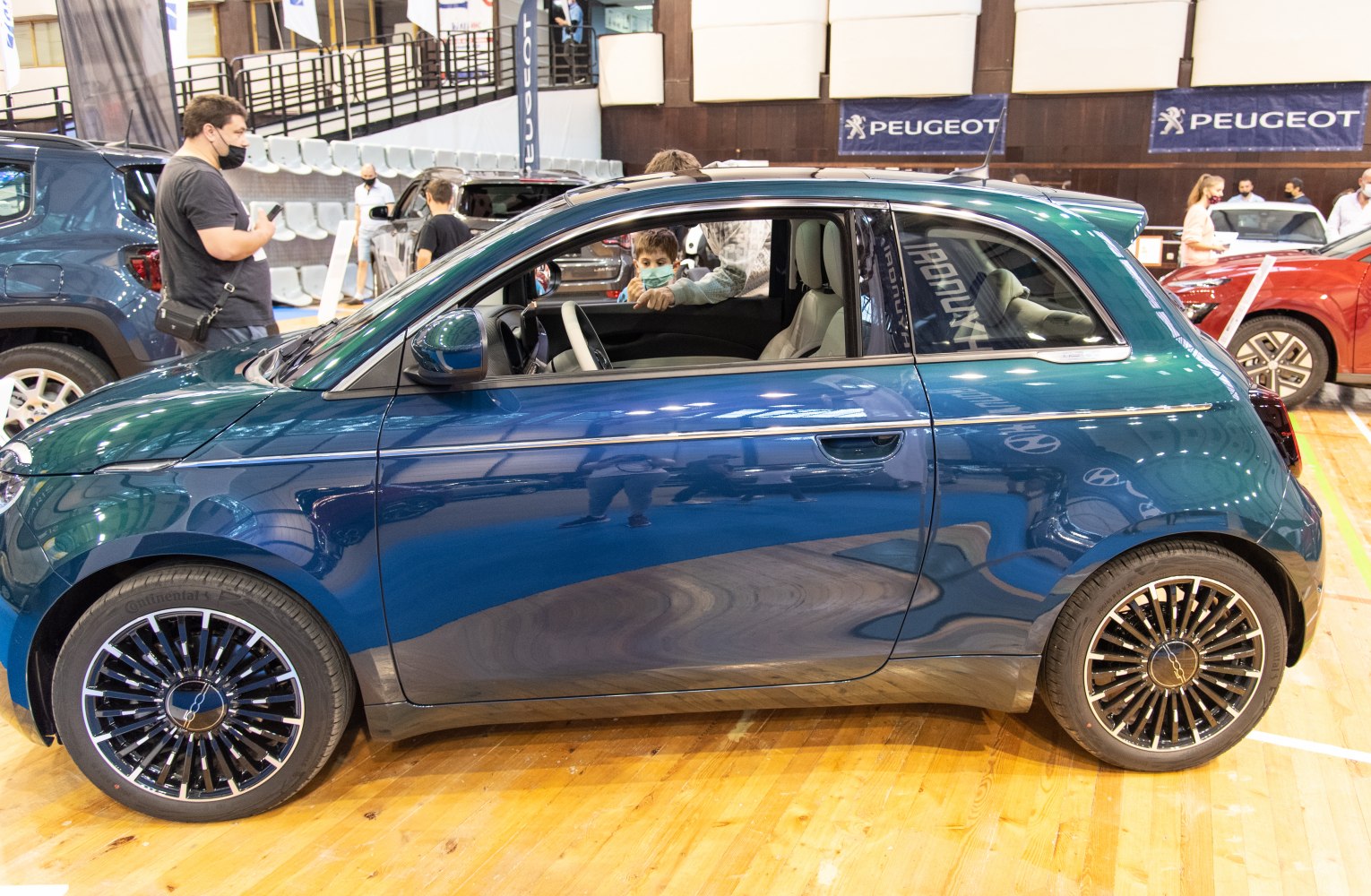 Compact electric hatchback side profile with distinctive wheel design