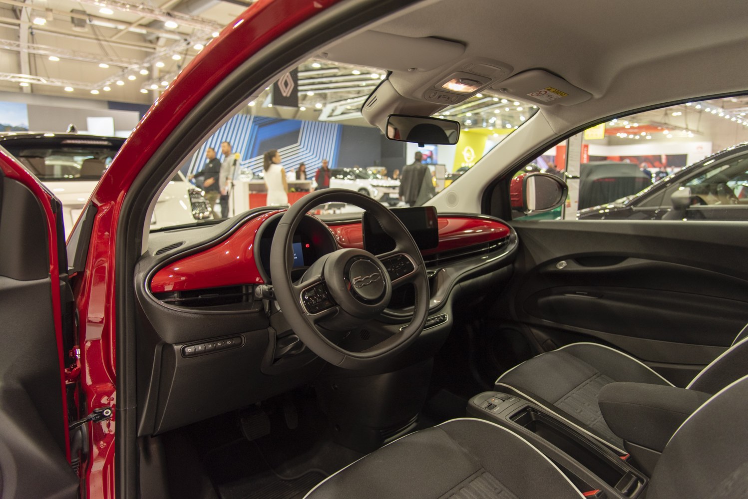 Modern dashboard and steering wheel of a compact electric vehicle