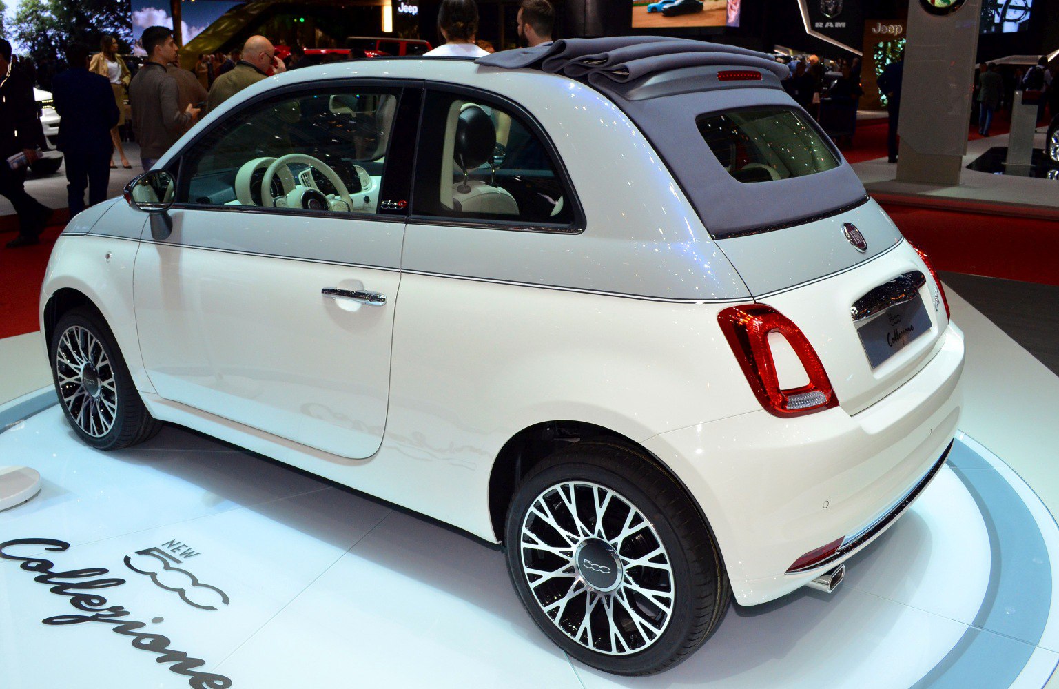Convertible compact car with fabric soft-top and alloy multi-spoke wheels
