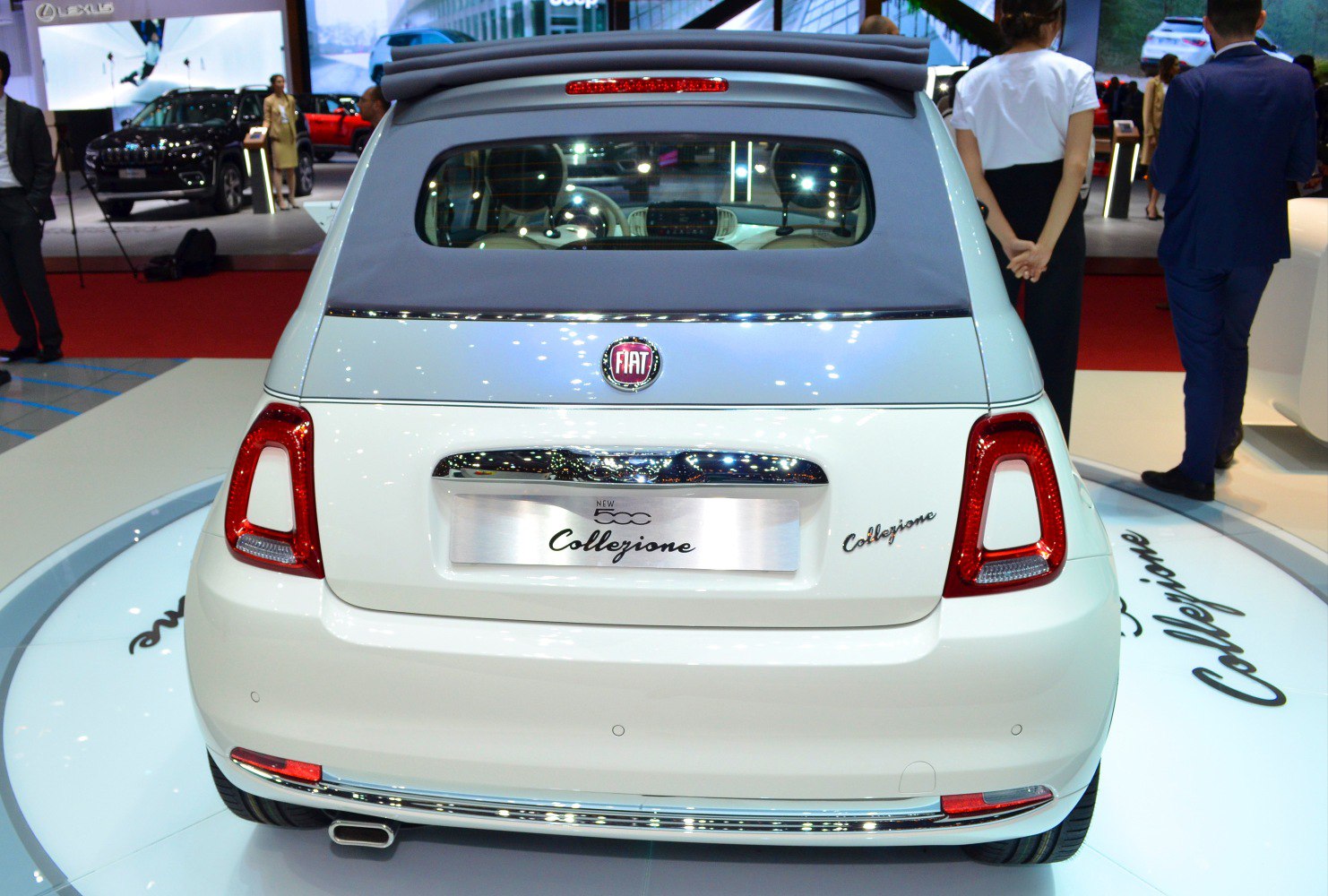 Rear view of a small convertible with fabric roof and modern taillights