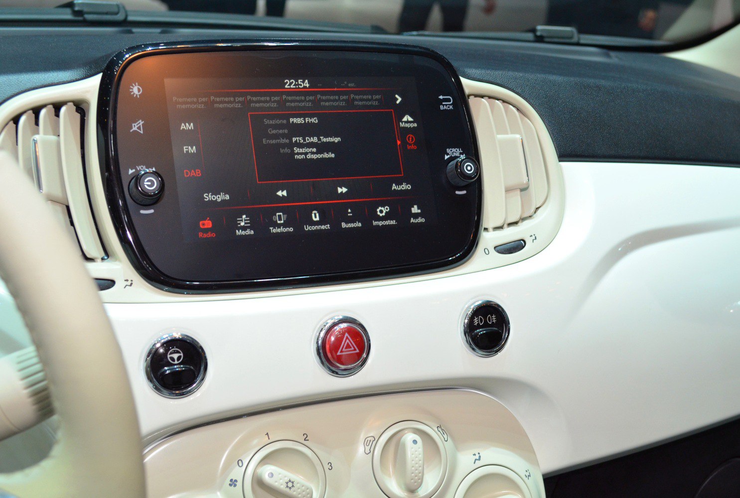 Touchscreen infotainment system and climate control dials detail
