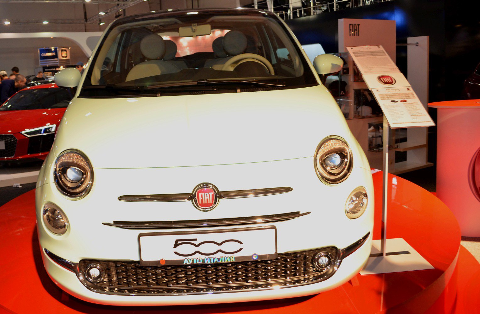 Front view with round headlights and chrome grille