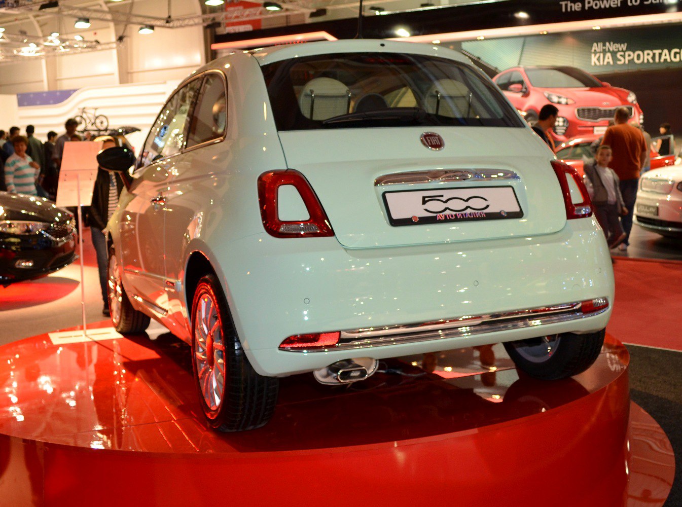 Rear view of compact hatchback with distinct taillights and chrome exhaust