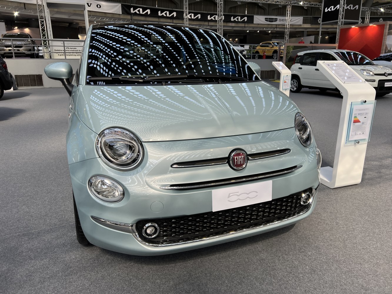 Front view with round headlights and grille