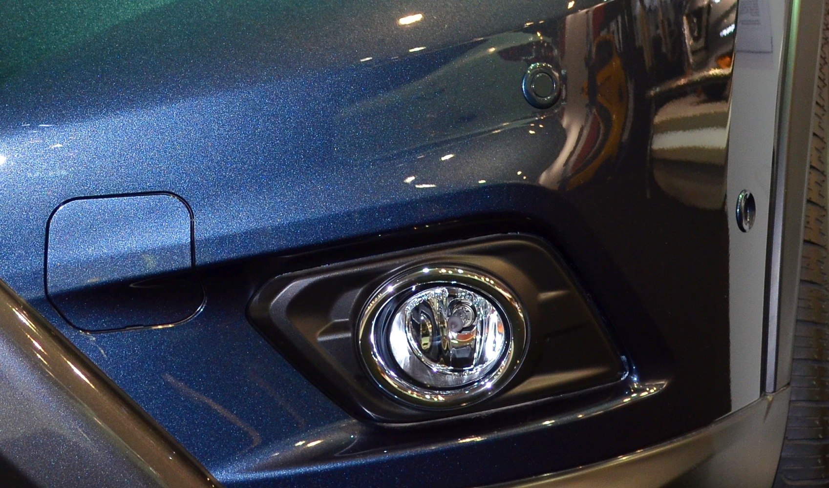 Close-up of fog light and front bumper design