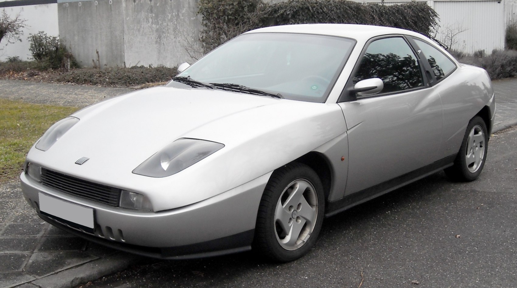 Front-side view with pop-up headlights and sporty streamlined body design