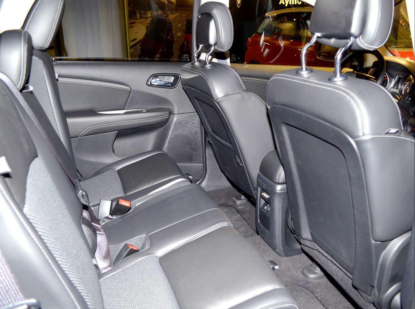 Rear interior with leather seats and door panel detail