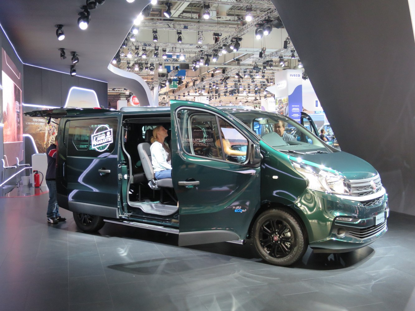 Van with sliding side door and interior seating