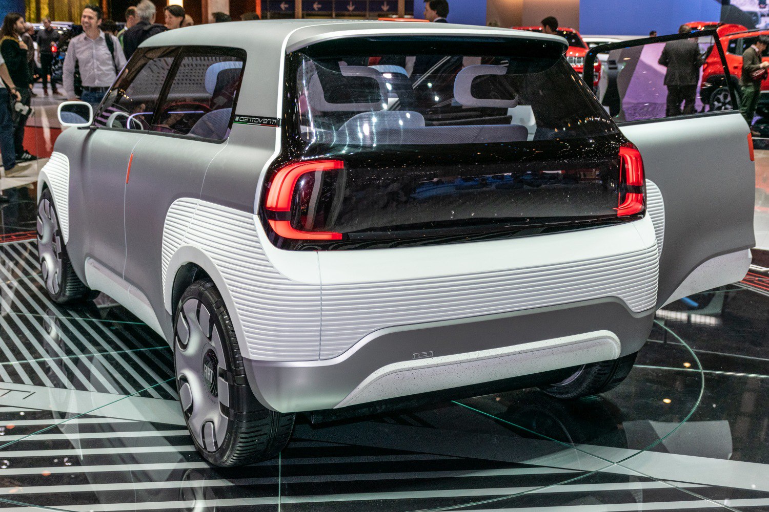 Rear view with distinctive taillights and open door