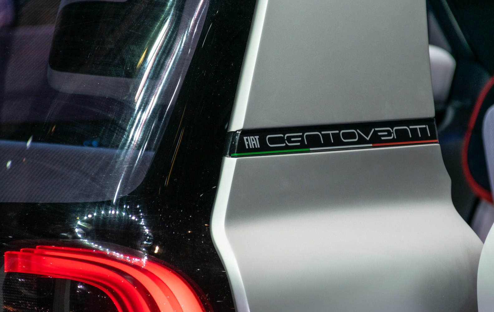 Close-up of rear badge and tail light design