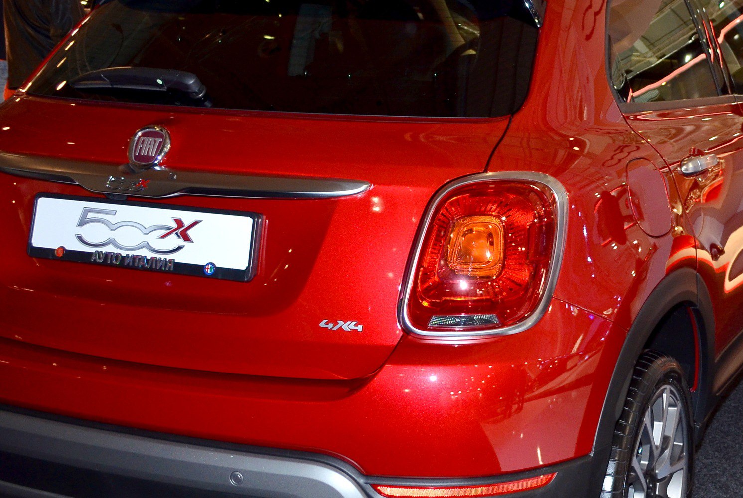 Red rear with 4x4 badge and distinctive taillight design