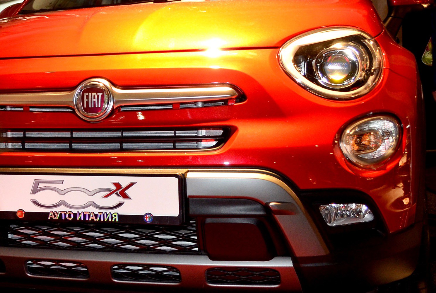 Close-up of front grille, headlights, and bumper of an off-road SUV