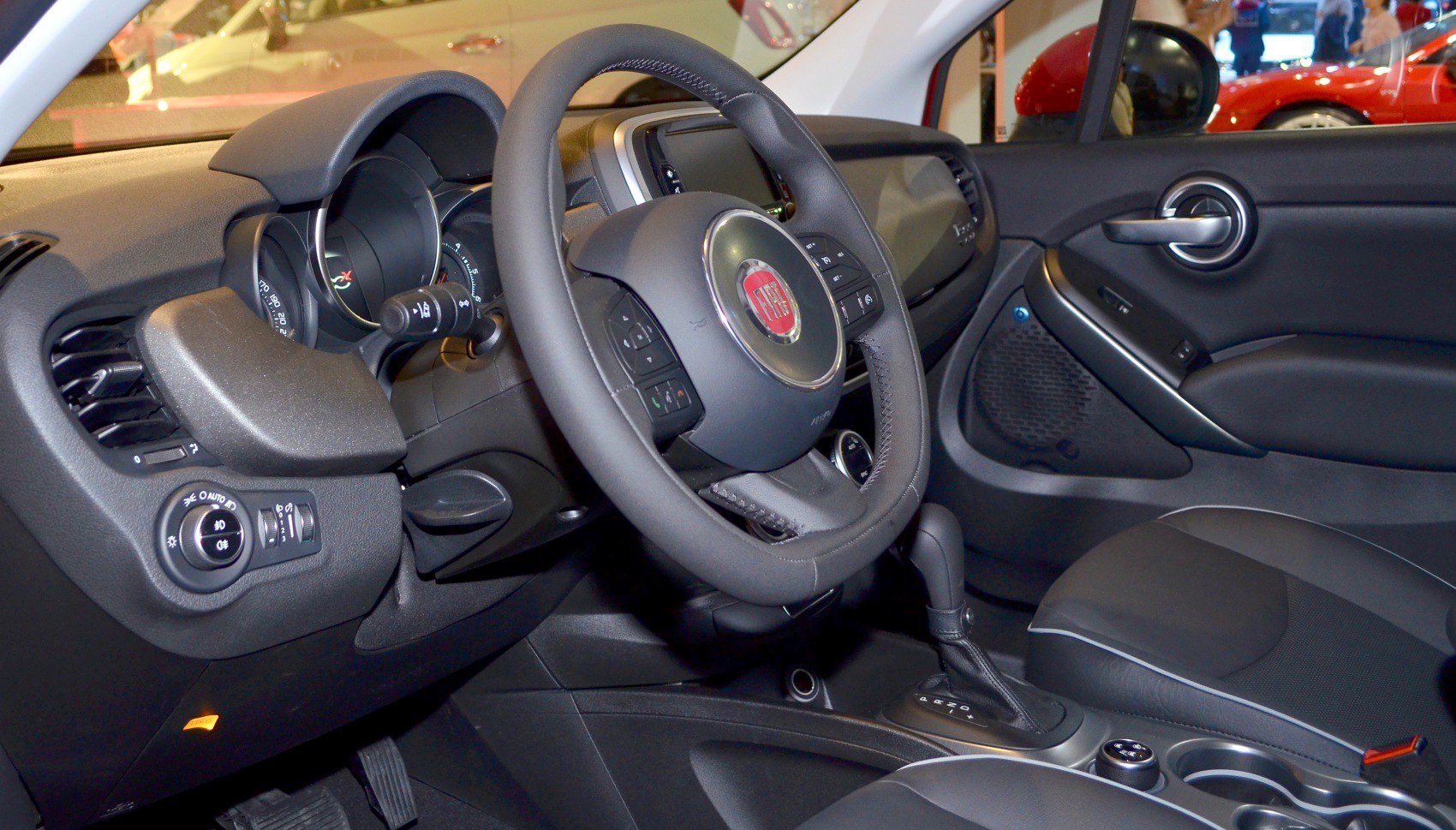 Dashboard, steering wheel, and center console interior close-up